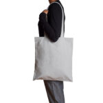 AS Colour Parcel Tote in colour Grey being worn by AS Colour model