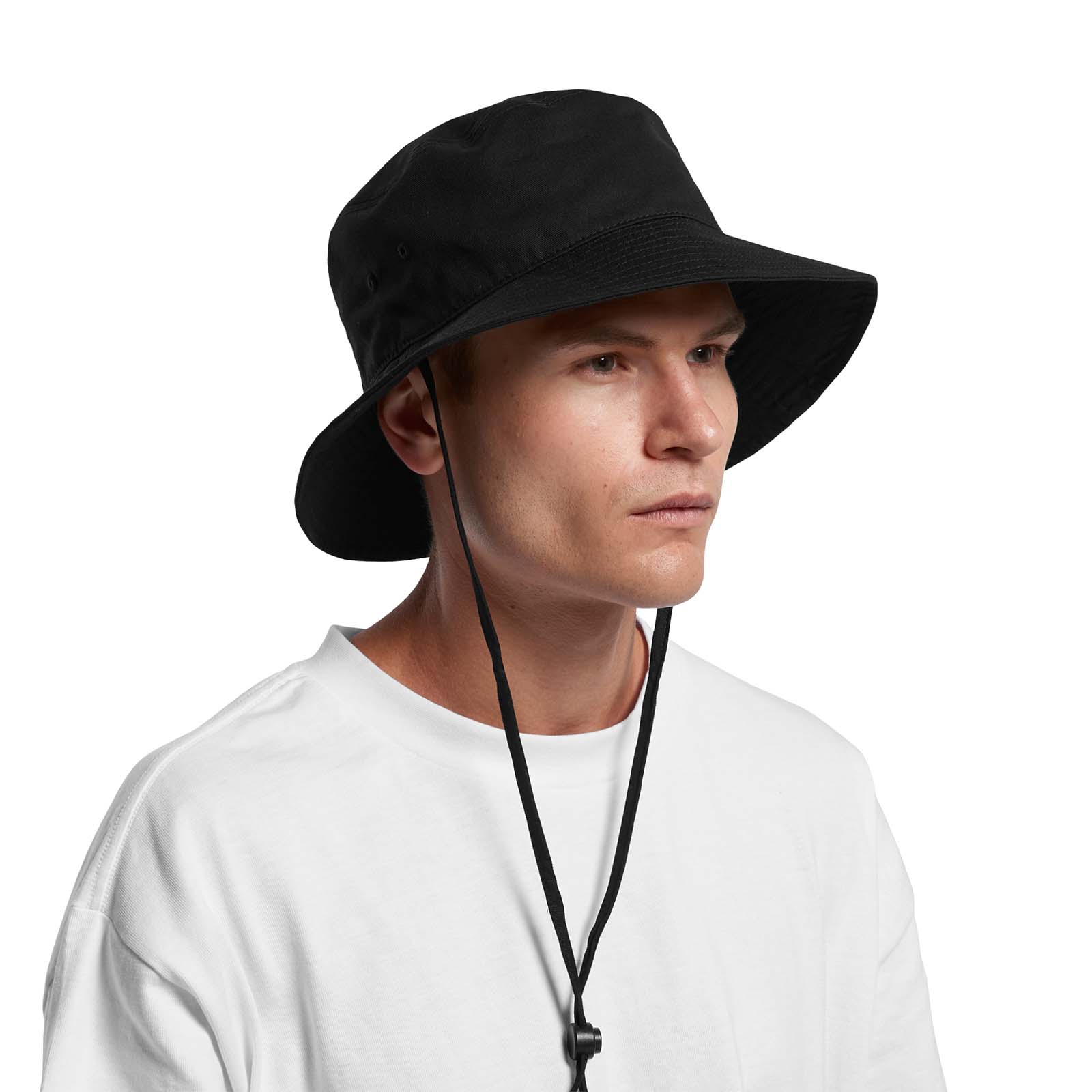 wide brim bucket hat in colour black, angled male model view