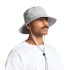 Nylon wide brim bucket hat worn by AS Colour model side view